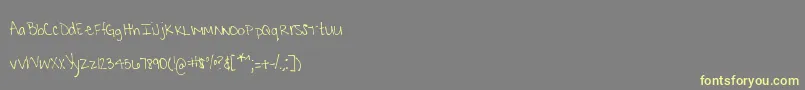 MtfKrystyna Font – Yellow Fonts on Gray Background