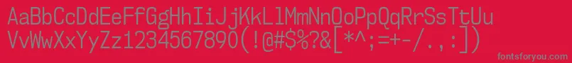 フォントNk57MonospaceCdBk – 赤い背景に灰色の文字