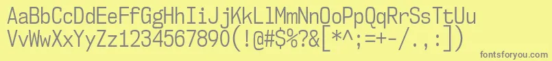 Nk57MonospaceCdBk Font – Gray Fonts on Yellow Background