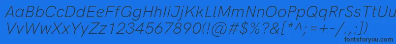 Fonte HkgroteskLightitalic – fontes pretas em um fundo azul