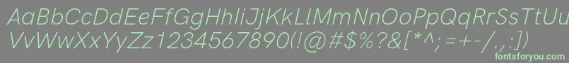 フォントHkgroteskLightitalic – 灰色の背景に緑のフォント