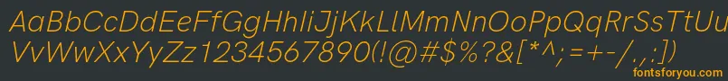 フォントHkgroteskLightitalic – 黒い背景にオレンジの文字