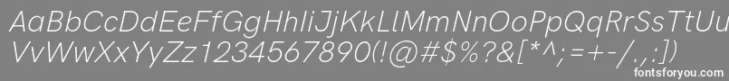 フォントHkgroteskLightitalic – 灰色の背景に白い文字