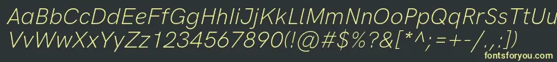 フォントHkgroteskLightitalic – 黒い背景に黄色の文字