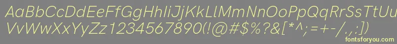 Шрифт HkgroteskLightitalic – жёлтые шрифты на сером фоне