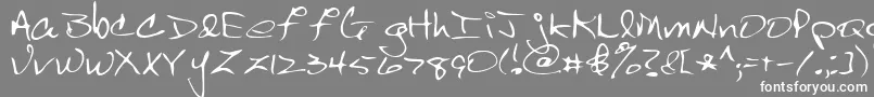 フォントScrawl – 灰色の背景に白い文字