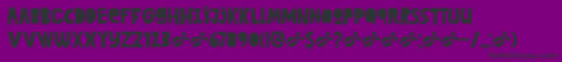 DkCutAlong Font – Black Fonts on Purple Background