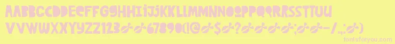 DkCutAlong Font – Pink Fonts on Yellow Background