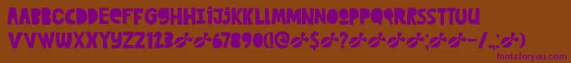 DkCutAlong Font – Purple Fonts on Brown Background