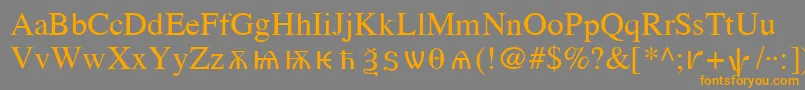 フォントOldChurchSlavonicCyr – オレンジの文字は灰色の背景にあります。
