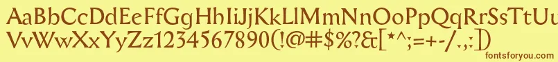 フォントAichel – 茶色の文字が黄色の背景にあります。