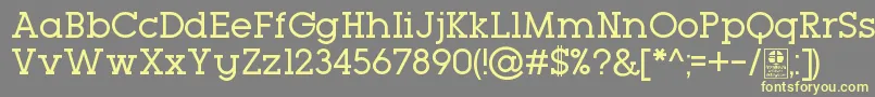 TypoGeoslabRegularDemo Font – Yellow Fonts on Gray Background