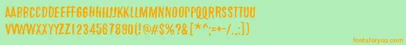 Шрифт MarchOfThePigs – оранжевые шрифты на зелёном фоне