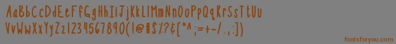 フォントKbsothinterestingbold – 茶色の文字が灰色の背景にあります。