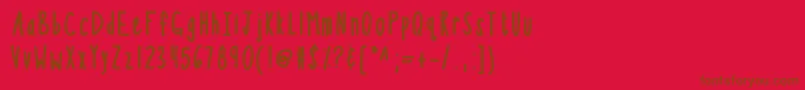 フォントKbsothinterestingbold – 赤い背景に茶色の文字