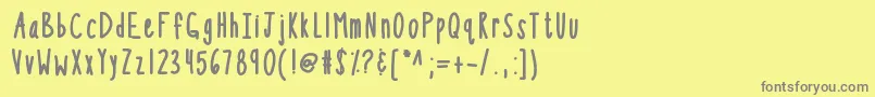 フォントKbsothinterestingbold – 黄色の背景に灰色の文字