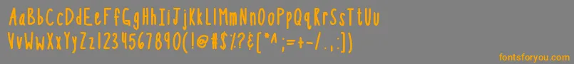 フォントKbsothinterestingbold – オレンジの文字は灰色の背景にあります。