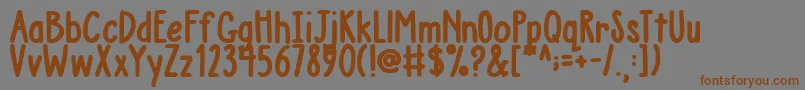 AustieBostChunkyDescription Font – Brown Fonts on Gray Background