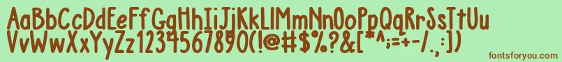 AustieBostChunkyDescription Font – Brown Fonts on Green Background