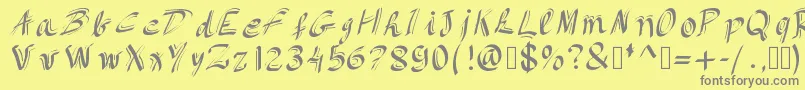 フォントItsbeautiful – 黄色の背景に灰色の文字