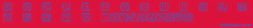 Woodcuttedcaps Font – Blue Fonts on Red Background