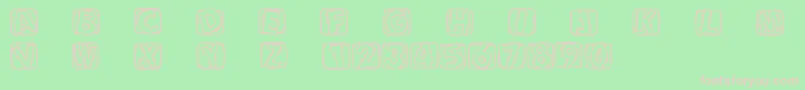 フォントWoodcuttedcaps – 緑の背景にピンクのフォント