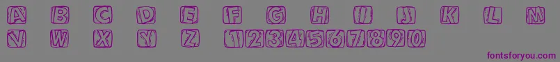 Woodcuttedcaps-fontti – violetit fontit harmaalla taustalla