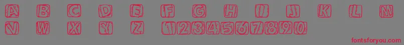 Woodcuttedcaps Font – Red Fonts on Gray Background