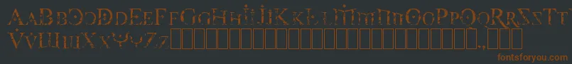 Foy3cis Font – Brown Fonts on Black Background