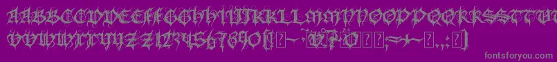 MbGothicSpell-fontti – harmaat kirjasimet violetilla taustalla