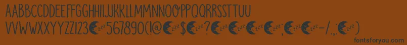 DkMoonlightSerenade Font – Black Fonts on Brown Background