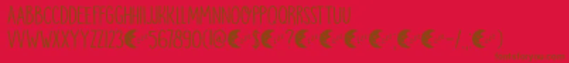 DkMoonlightSerenade-Schriftart – Braune Schriften auf rotem Hintergrund