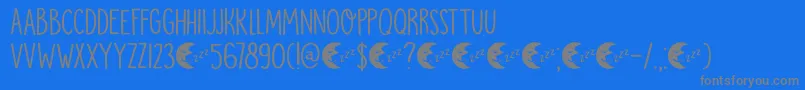 Fonte DkMoonlightSerenade – fontes cinzas em um fundo azul