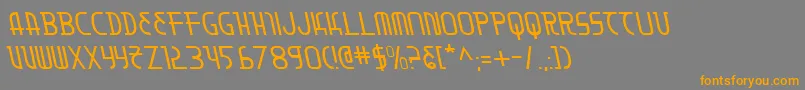 フォントMoondartl – オレンジの文字は灰色の背景にあります。