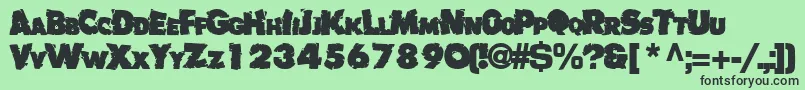 Czcionka Badlychipped66Bold – czarne czcionki na zielonym tle