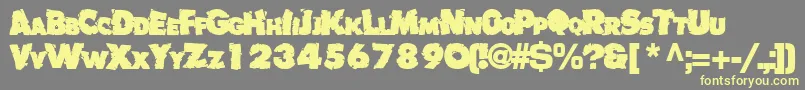 Badlychipped66Bold Font – Yellow Fonts on Gray Background