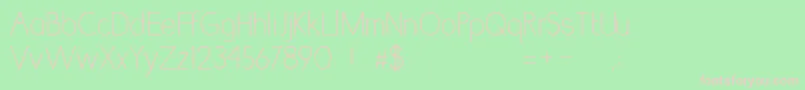 LumniaThin-Schriftart – Rosa Schriften auf grünem Hintergrund