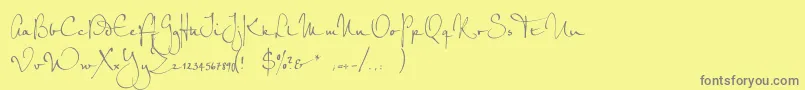 PetrascriptefRegular Font – Gray Fonts on Yellow Background