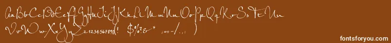 フォントPetrascriptefRegular – 茶色の背景に白い文字