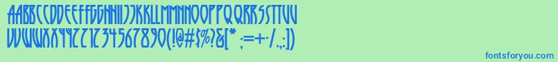フォントRunytunesrevisitednf – 青い文字は緑の背景です。