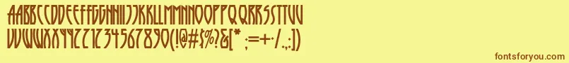 Шрифт Runytunesrevisitednf – коричневые шрифты на жёлтом фоне