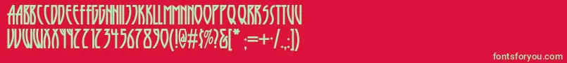 フォントRunytunesrevisitednf – 赤い背景に緑の文字
