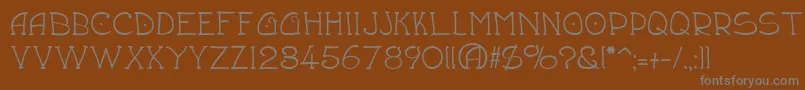 フォントDraughtsman – 茶色の背景に灰色の文字