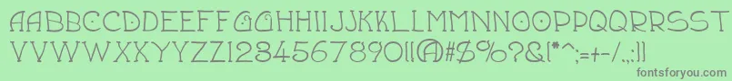 フォントDraughtsman – 緑の背景に灰色の文字