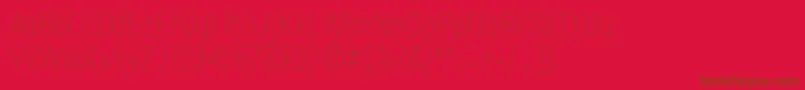 LuginaFpLight-Schriftart – Braune Schriften auf rotem Hintergrund
