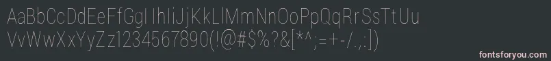 Czcionka LuginaFpLight – różowe czcionki na czarnym tle