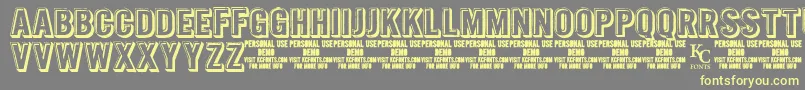 IntagliodemoKcfonts Font – Yellow Fonts on Gray Background