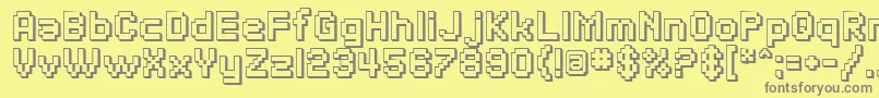 フォントSfPixelateShadedBold – 黄色の背景に灰色の文字
