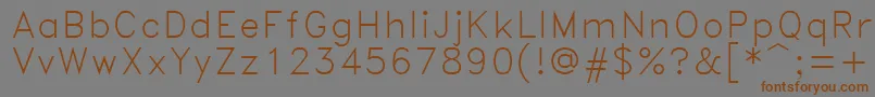Romand Font – Brown Fonts on Gray Background