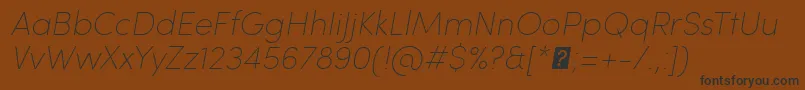 SofiaProUltralightItalic Font – Black Fonts on Brown Background